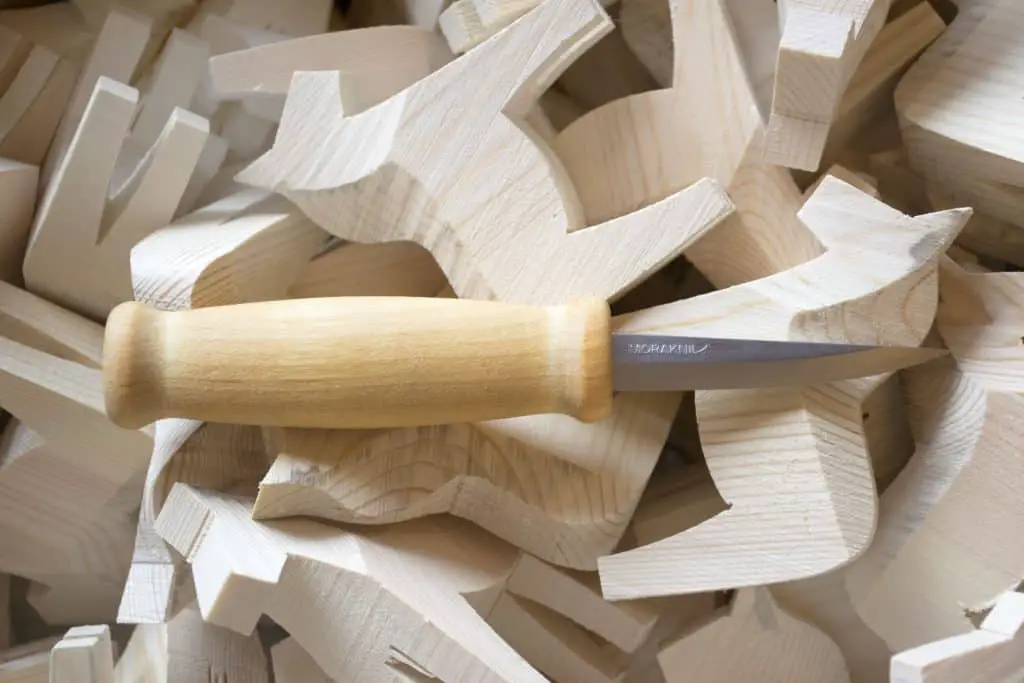 Morakniv Wood Carving 105 Knife on wooden horses